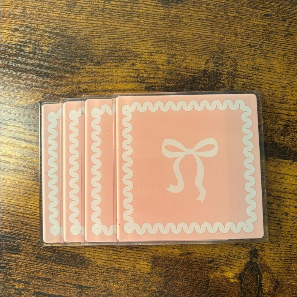 Pink Coasters with White Bow Design